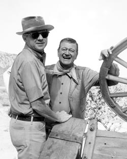 Burt Kennedy with John Wayne on the set of War Wagon (1967)