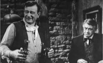 John Wayne and Paul Fix - in El Dorado