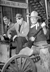 Ford (center), Stewart, and Wayne on the set of The Man Who Shot Liberty Valance